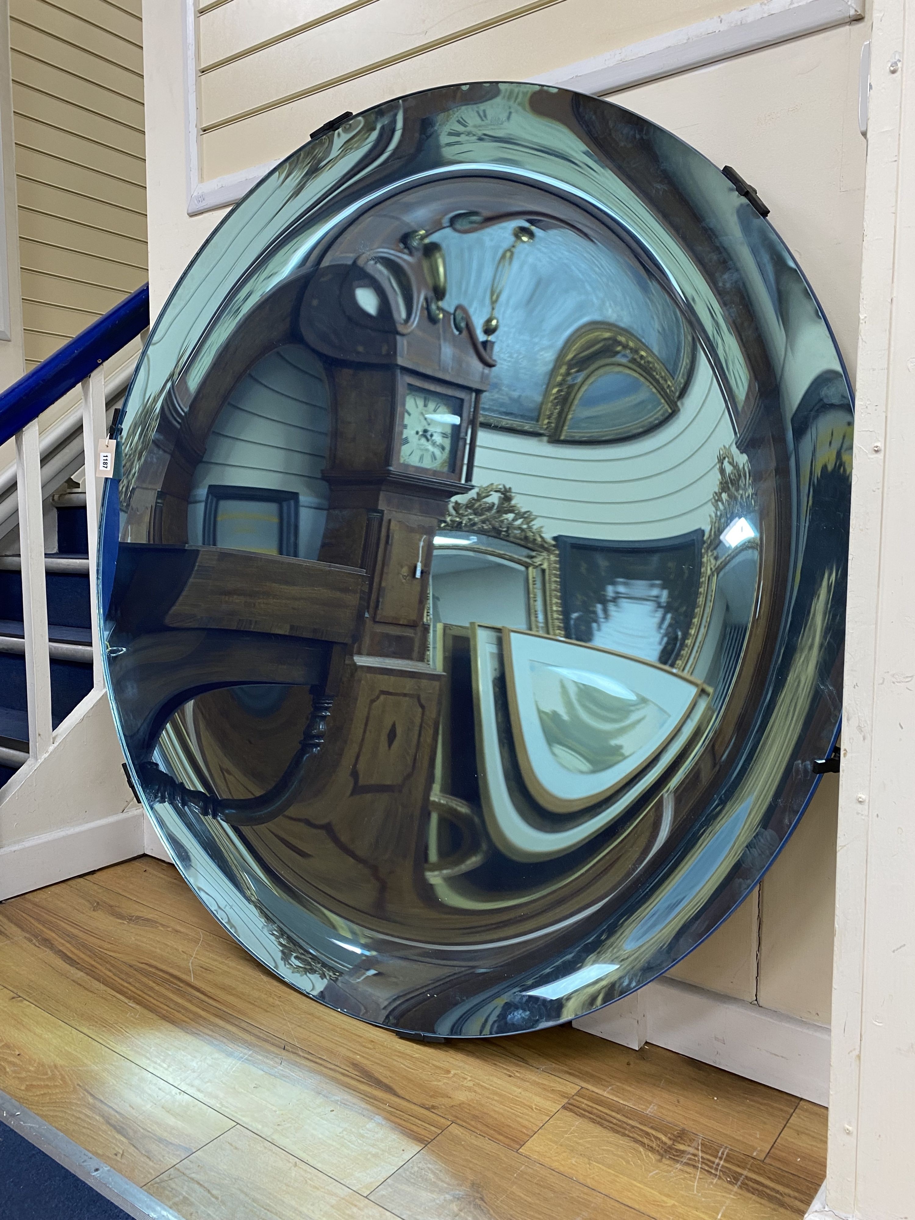 An Anish Kapoor style blue domed / concave mirror, Made by The Glass House, Tunbridge Wells. 135cm diameter